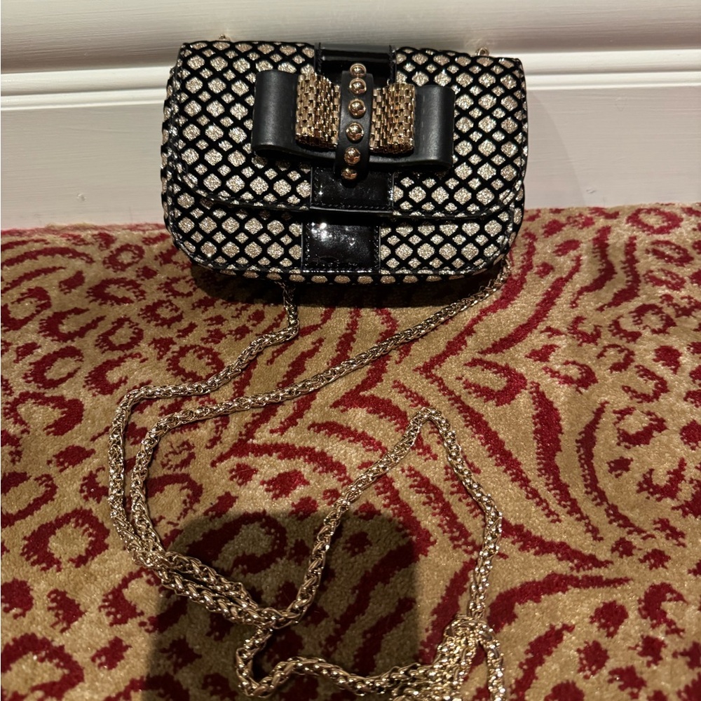 CHRISTIAN LOUBOUTIN GOLD AND BLACK mini bag